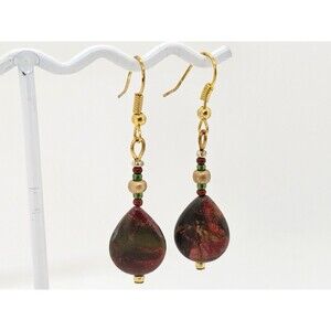 Polished Teardrop Stone Earrings On Gold Tone Metal